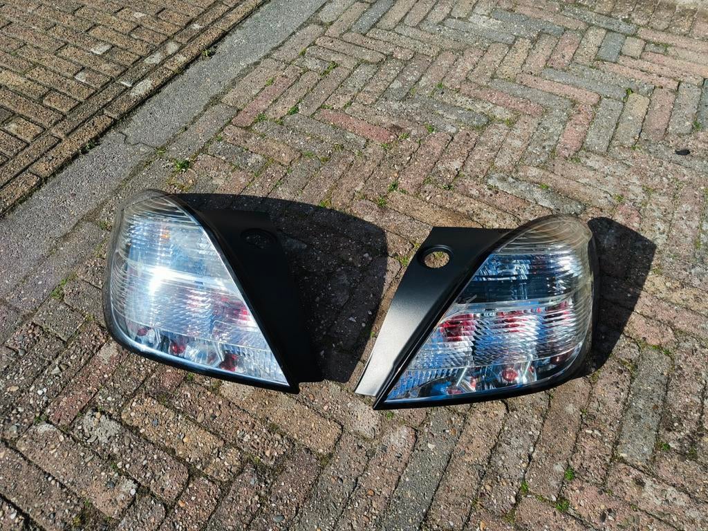 Hella Achterlichten Opel Astra H GTC / Hatchback (OPC), Ophalen of Verzenden, Opel