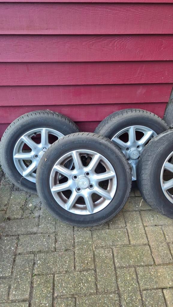 Set winterbanden met velg 155/70 R 13, Ophalen, Gebruikt