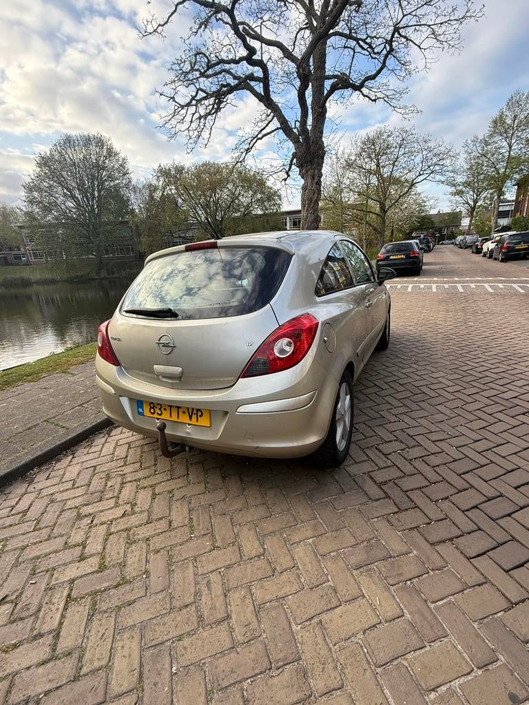 Opel Corsa 1.2 16V 3D WR 2007 Beige, Auto's, Opel, Voorwielaandrijving, 450 kg, 40 €/maand, 4 cilinders