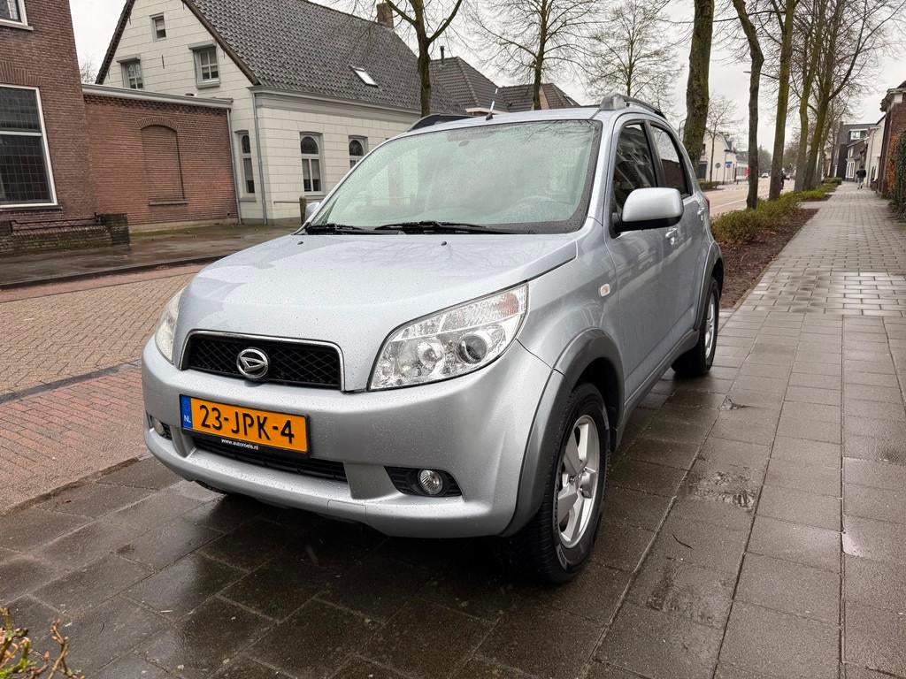 Daihatsu Terios 1.5-16v Adventure 4X4 NAVI AIRCO NIEUWE KOPP, Auto's, Daihatsu, 1350 kg, Gebruikt, Zwart, 1165 kg