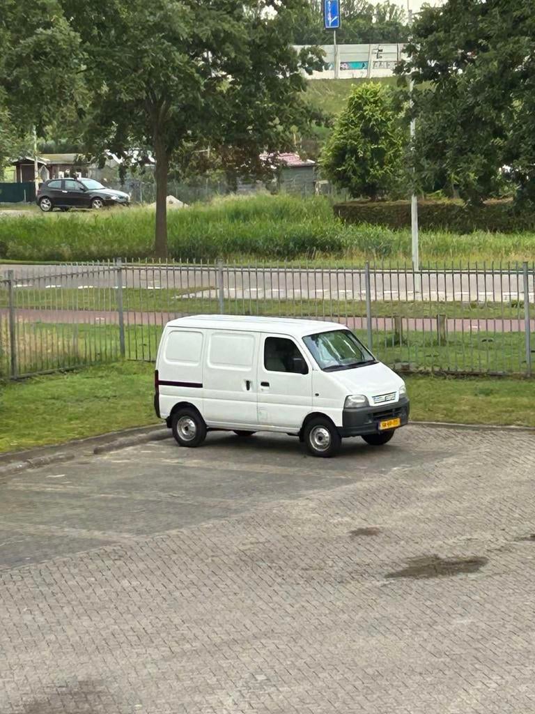 Gratis  - Suzuki carry model 1.3 achterdemper + naafkapjes!, Ophalen of Verzenden
