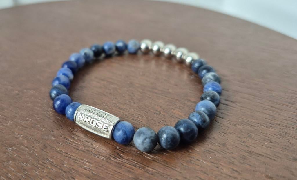 Blauwe Rebel en Rose armband dames heren mannen vrouwen &, Ophalen of Verzenden, Zo goed als nieuw, Blauw, Elastiek