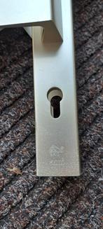 Tekoop veiligheid  deur klink  2 zie foto's, Ophalen, Klink of Kruk