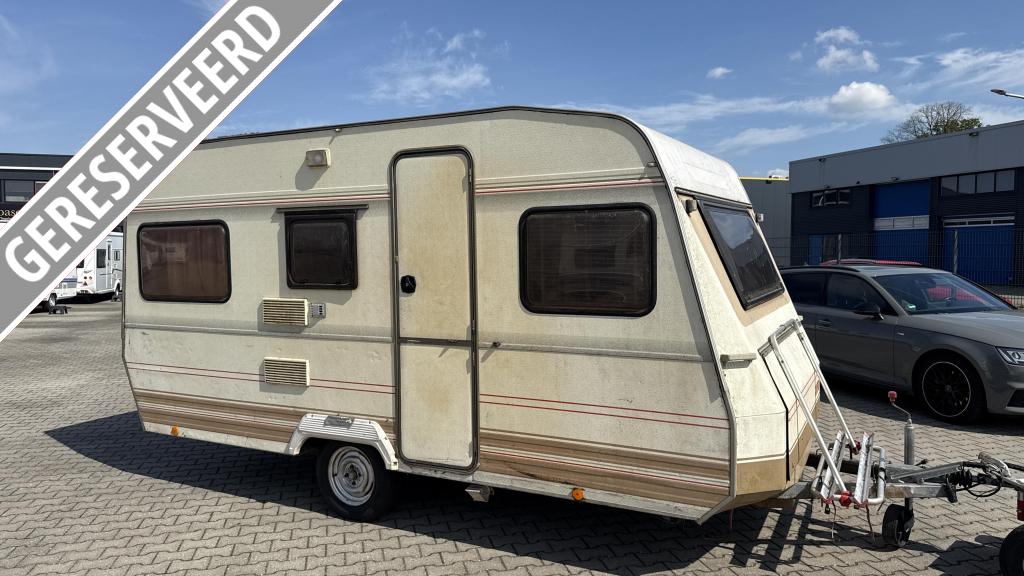 Dethleffs Camper 430 T bouwjaar 1989 met voortent en luifel, Caravans en Kamperen, Overige typen, Bedrijf, 500 - 750 kg, Kachel