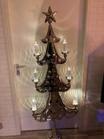 Chromen kerstboom, Ophalen