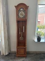 Staande klok van massief eiken, Ophalen