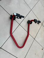 Motorfiets achterbrug standaard, Ophalen