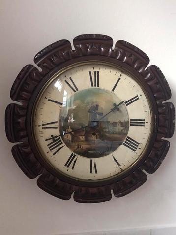 Snek klok met draaiende molenwieken mechaniek beschikbaar voor biedingen