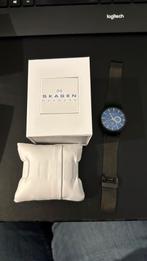 Skagen horloge zwart met blauwe wijzerplaat, Sieraden, Tassen en Uiterlijk, Horloges | Heren, Overige merken, Staal, Gebruikt