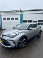 Toyota C-HR 2.0 Hybrid 184pk CVT 2023 Grijs NAP, Auto's, Zwart, 4 cilinders, Leder, Bedrijf