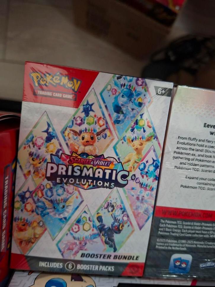 Prismatic Evolutions Booster Bundle, Hobby en Vrije tijd, Verzamelkaartspellen | Pokémon, Nieuw, Boosterbox, Ophalen