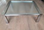 Salontafel met glazen blad en RVS poten. Merk Bony Design., Ophalen, Gebruikt, 100 tot 150 cm, 50 tot 100 cm