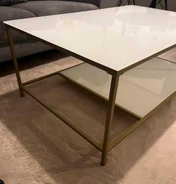 Witte glazen salontafel met gouden frame