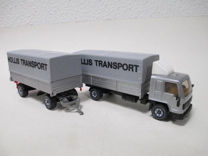 Siku 3115 Volvo FL10 Intercooler 1986 HOLLIS Transport, Hobby en Vrije tijd, Modelauto's | Overige schalen, Zo goed als nieuw