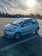 Toyota Aygo 1.0 12V Vvt-i 5DRS 2006 Blauw, Auto's, Voorwielaandrijving, Zwart, 68 pk, Origineel Nederlands