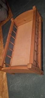 Houten poppenbedje, Ophalen