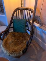 Rotan fauteuil, Ophalen