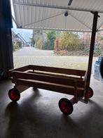 Houten bolderkar met rode wielen, Ophalen, Gebruikt