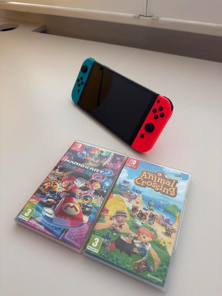 Nintendo Switch OLED Blauw Rood, Spelcomputers en Games, Spelcomputers | Nintendo Switch, Zo goed als nieuw, Switch OLED, Met 2 controllers