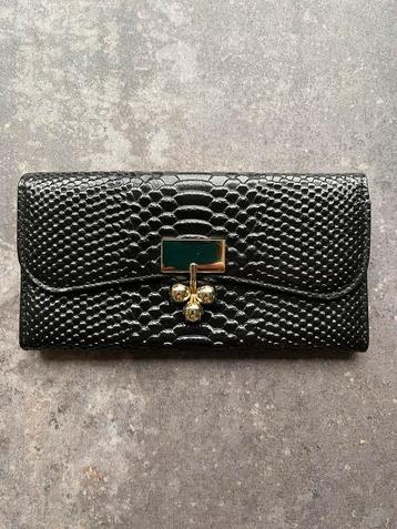 Clutch beschikbaar voor biedingen
