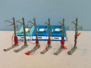 Märklin 7010 aansluitmasten bovenleiding met spangewichten beschikbaar voor biedingen