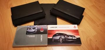 2 x handleiding Mitsubishi Lancer + mapjes beschikbaar voor biedingen