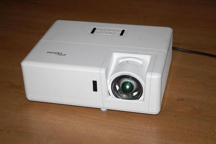 FullHD Daglicht laser Beamer Optoma ZH406ST! Twv €3000!, Audio, Tv en Foto, Beamers, Zo goed als nieuw, DLP, Full HD (1080), Ophalen of Verzenden