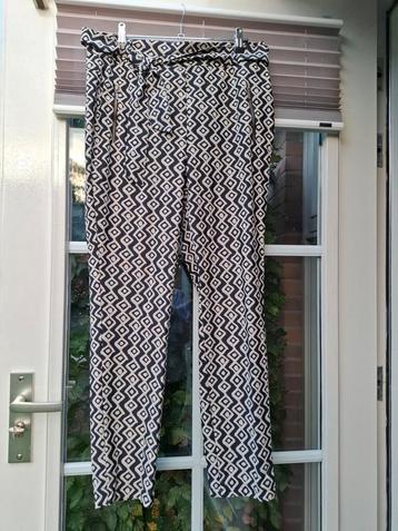 Broek. Travelstof. Met strikceintuur. Elvira. Maat 40 beschikbaar voor biedingen