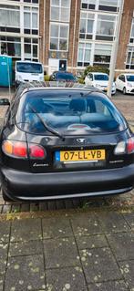 Daewoo Lanos 1.3 2003 Zwart, Auto's, Daewoo, Voorwielaandrijving, Stof, 74 pk, 4 cilinders