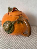 Decoratieve aardewerk theepot, Ophalen