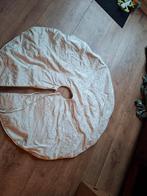 Kerstboomkleed, Ophalen