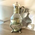 Karaf van verzilverd glas met bijpassende warmhouder., Antiek en Kunst, Antiek | Glas en Kristal, Ophalen of Verzenden