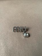 Nieuwe zilverkleue Miu Miu broche, Ophalen of Verzenden, Nieuw, Goud, Overige materialen