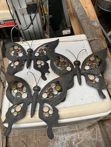 Metalen vlinders met keramische details beschikbaar voor biedingen