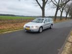 Volvo V70 2.4 D5 AUT 2004 Grijs, Zwart, 1850 kg, Leder en Stof, 163 pk