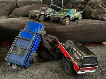 3 Radiobestuurbare autos 2 slashes en 1 off-road/trail autos beschikbaar voor biedingen