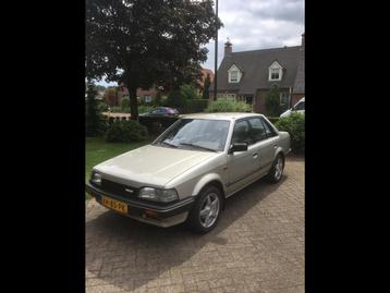 Mazda 323 automaat bj .1989