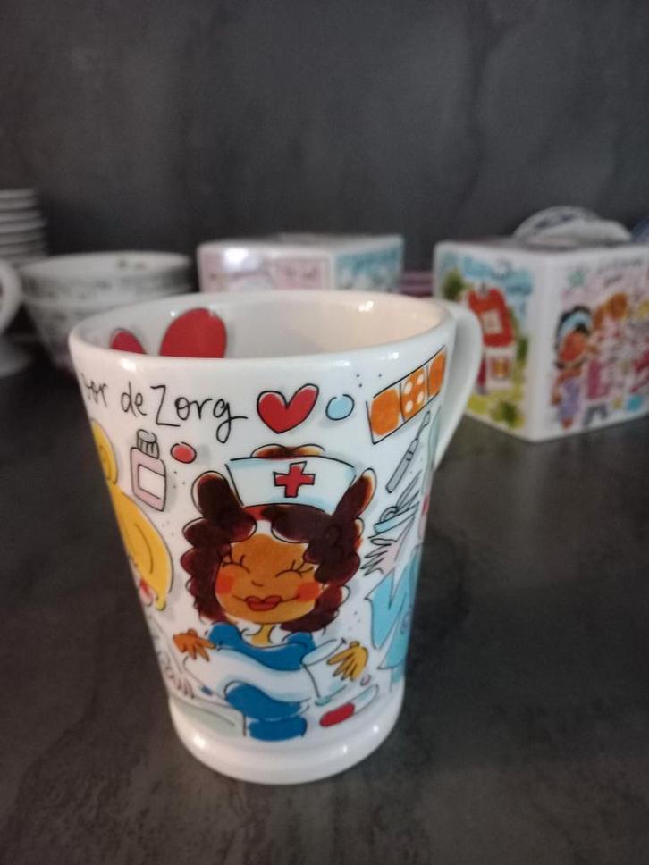 Blond Amsterdam Hart voor de Zorg Beker, Huis en Inrichting, Keuken | Servies, Zo goed als nieuw, Kop(pen) en/of Schotel(s), Blond Amsterdam