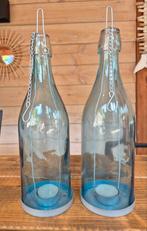 2 blauwe, glazen flesvormige windlichten, Ophalen, Zo goed als nieuw