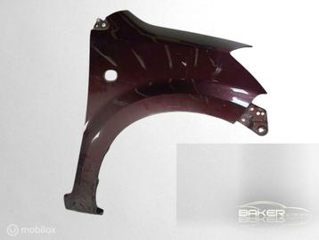 Spatbord rechts bruin Subaru Justy 1.0 Comfort ('85-'11) beschikbaar voor biedingen