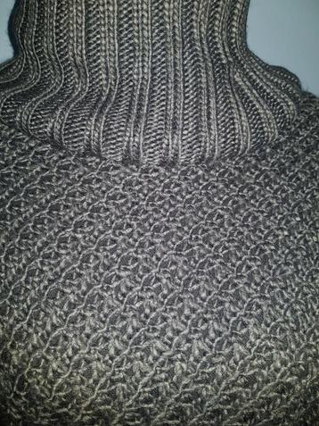 Nette grijze poncho
Maat S/M
 beschikbaar voor biedingen