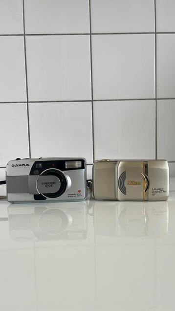 Twee compactcamera’s Nikon + Olympus beschikbaar voor biedingen
