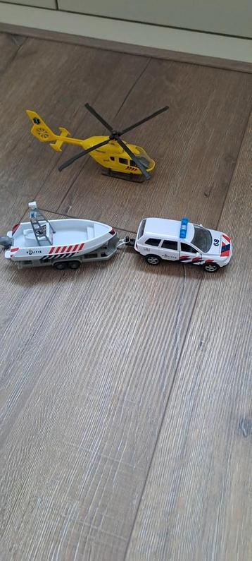 Speelgoed Traumaheli, Politieauto & Boot beschikbaar voor biedingen