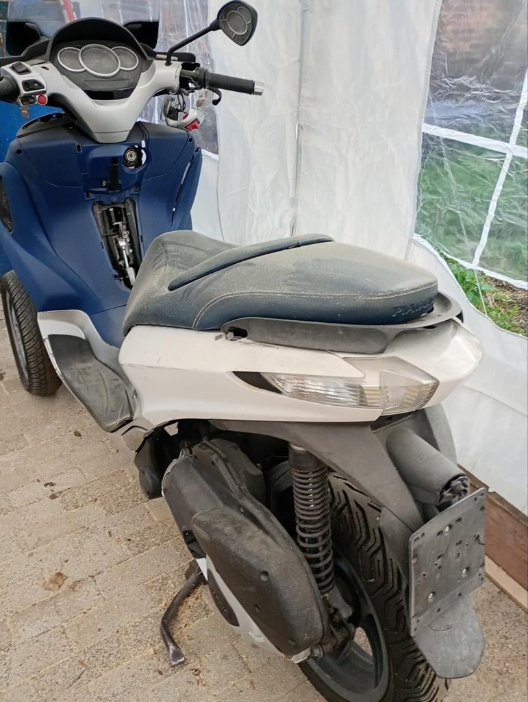 Piaggio mp3  125 cc, Ophalen