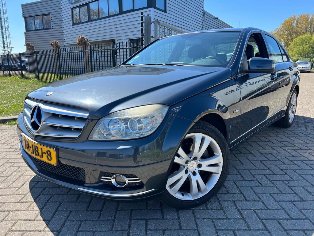 Mercedes-Benz C-Klasse C180 Kompr. Sedan 2009 Half Leer, Leder en Stof, Handgeschakeld, Parkeersensor, Sedan