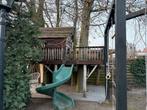 Robuuste houten boomhut met glijbaan en schommel, Ophalen of Verzenden, Gebruikt, Hout