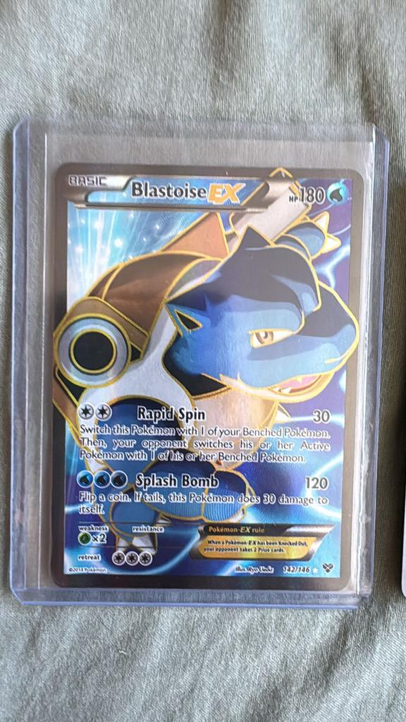 Blastoise EX 142/146, Hobby en Vrije tijd, Verzamelkaartspellen | Pokémon, Ophalen of Verzenden, Zo goed als nieuw
