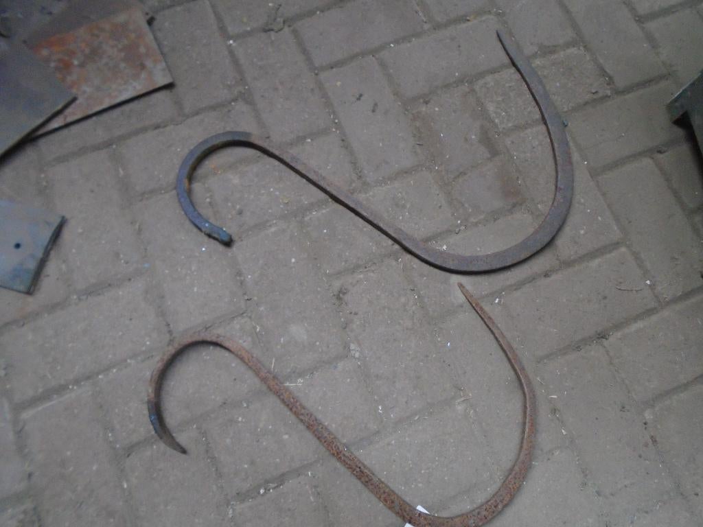 dakhaken voor de rietdekker, Ophalen