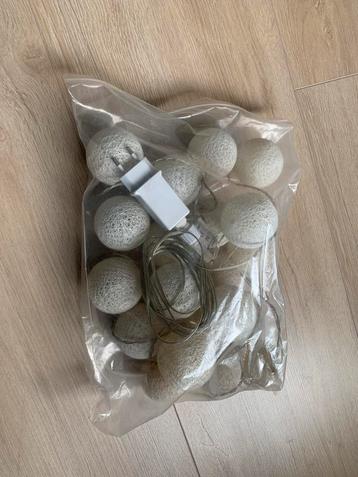 Slinger met lampjes beschikbaar voor biedingen