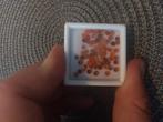 Lot met oranje ronde carneool cabochons, Ophalen of Verzenden, Zo goed als nieuw